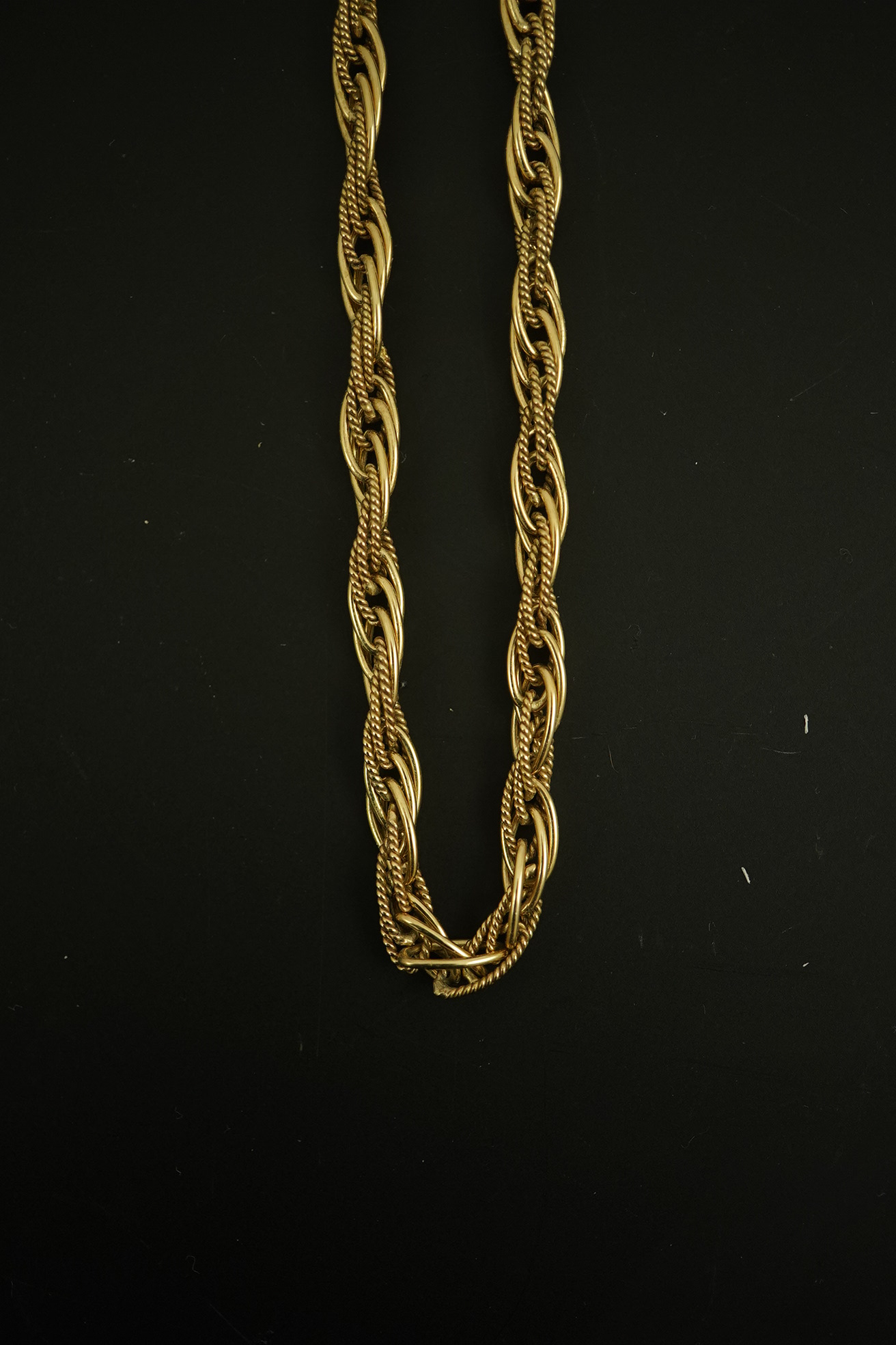 A modern 9ct gold multi oval link interwoven necklace